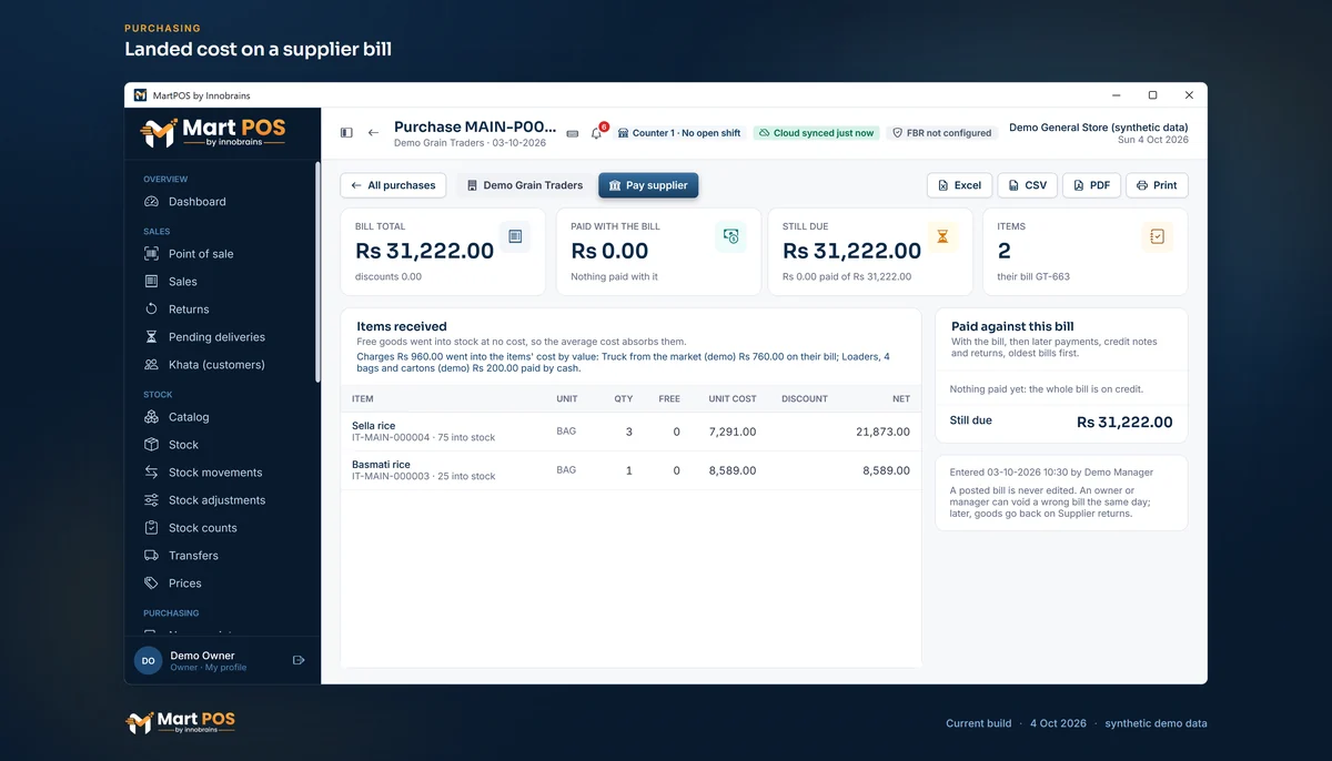 A posted purchase from Demo Grain Traders of Rs 31,222.00 for three bags of sella rice and one of basmati, with Rs 960.00 of charges shared by value: Rs 760.00 freight on the supplier's bill and Rs 200.00 to the loaders in cash